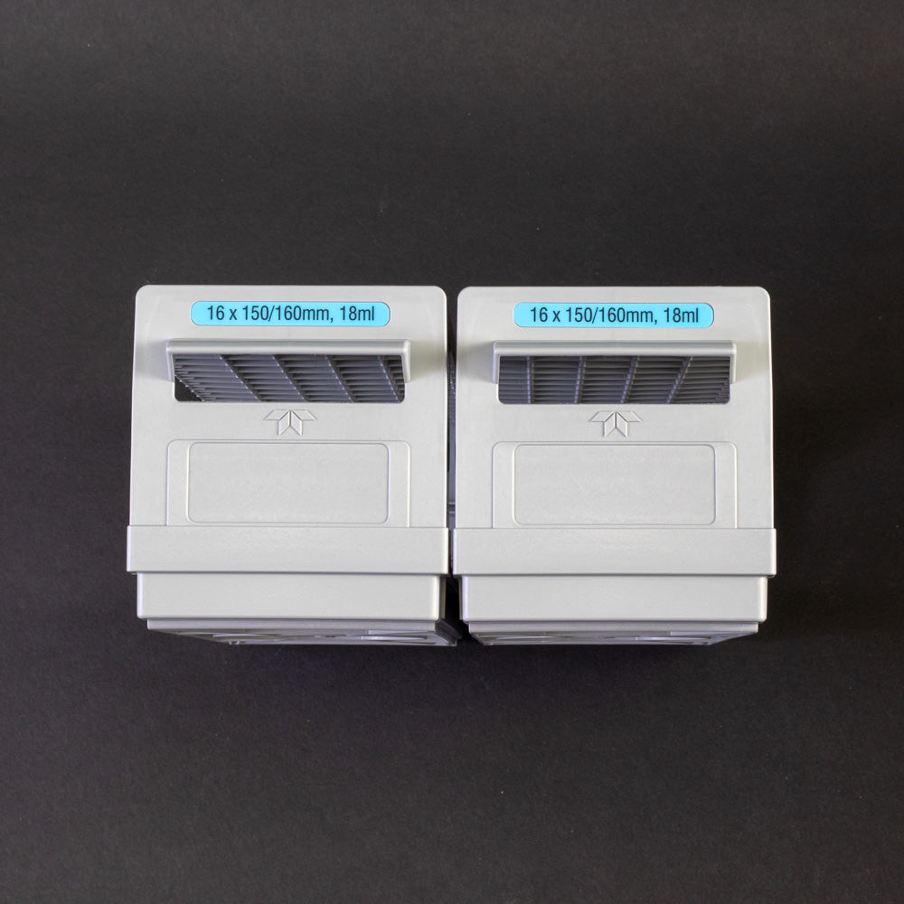 A pair of gray plastic shelves with perforated design, allowing for location and storage of vials.