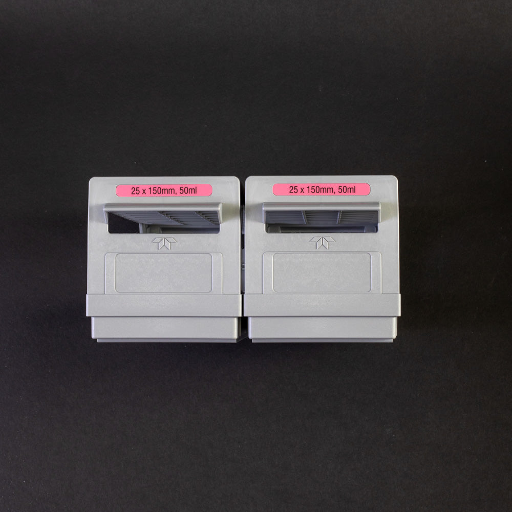 A pair of gray plastic shelves with perforated design, allowing for location and storage of vials.