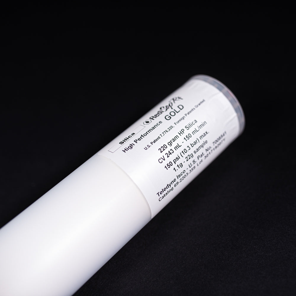 A small white tube displayed on a black background, creating a striking visual contrast between the two elements.