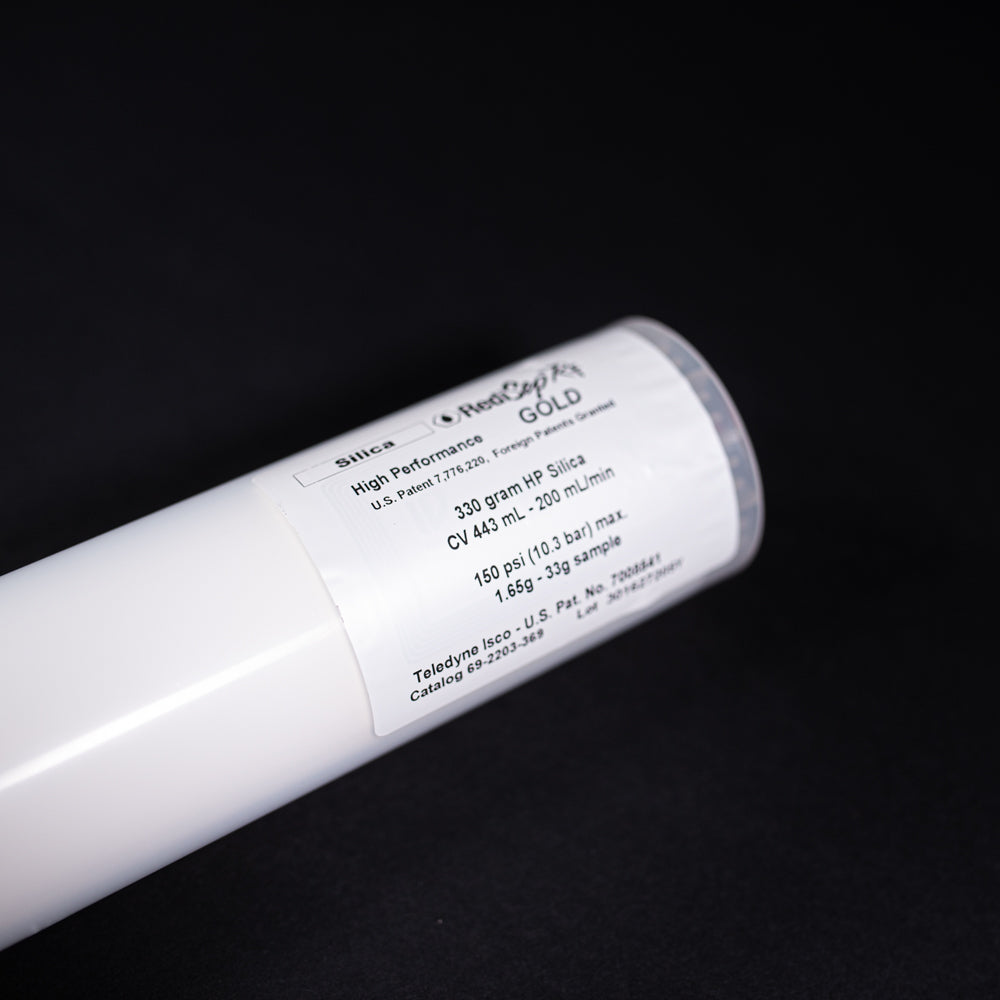 A small white tube displayed on a black background, creating a striking visual contrast between the two elements.