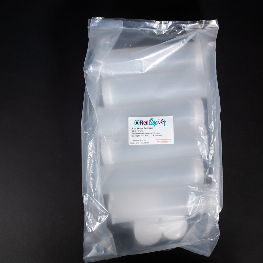 A set of small clear plastic cartridges displayed in a bag on a black background, creating a striking visual contrast between the two elements.