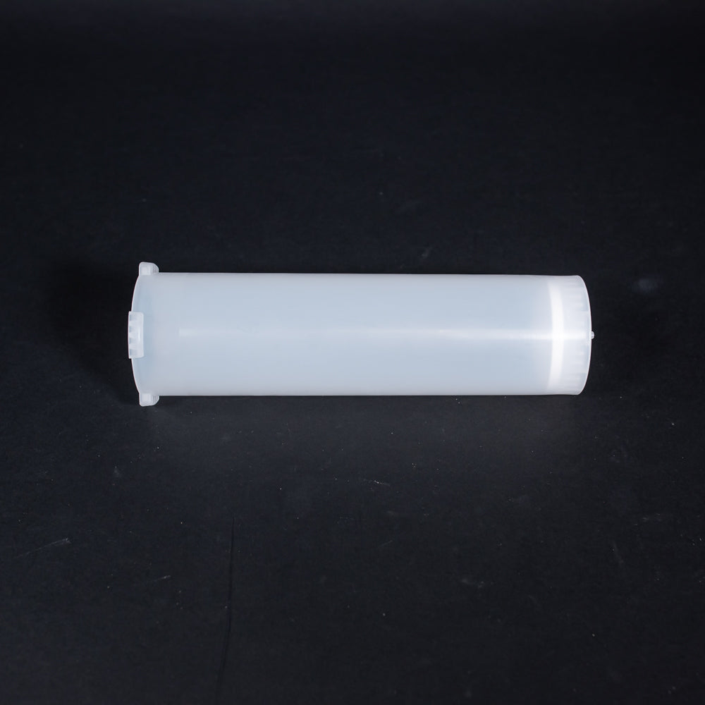 A small clear plastic cartridge displayed on a black background, creating a striking visual contrast between the two elements.