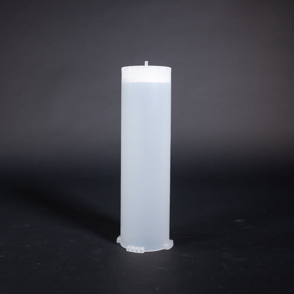 A small clear plastic cartridge displayed on a black background, creating a striking visual contrast between the two elements.