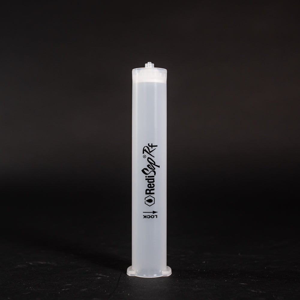 A small clear plastic cartridge displayed on a black background, creating a striking visual contrast between the two elements.