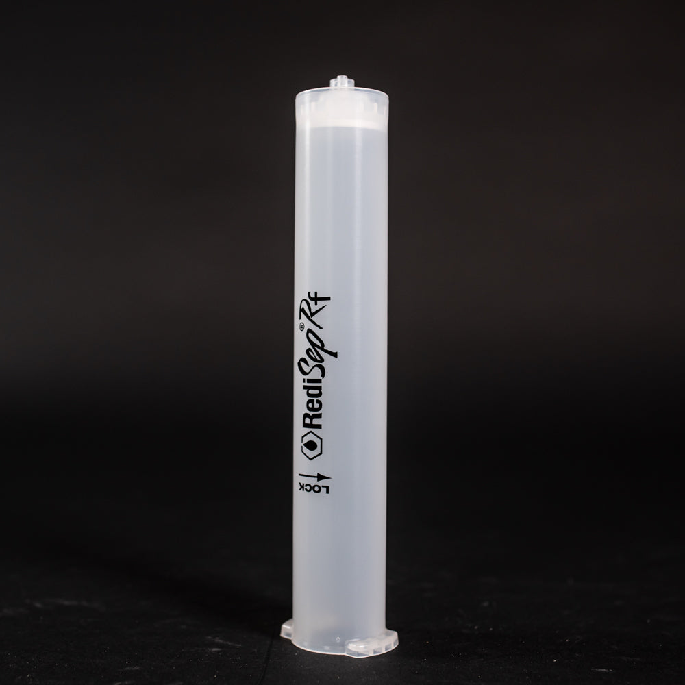 A small clear plastic cartridge displayed on a black background, creating a striking visual contrast between the two elements.