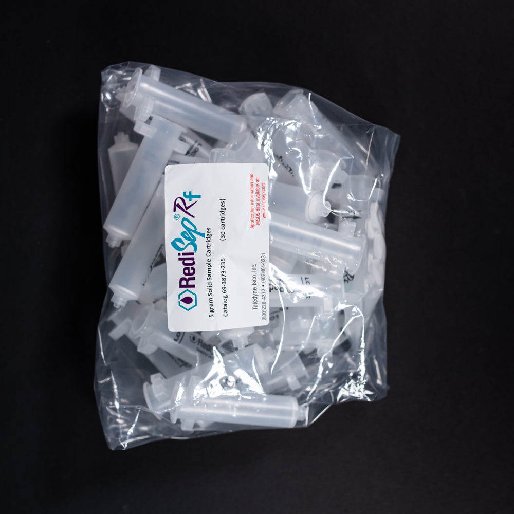A set of small clear plastic cartridges displayed in a plastic bag on a black background, creating a striking visual contrast between the two elements.