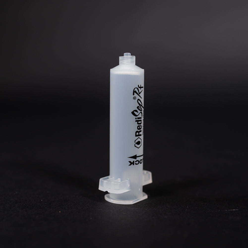 A small clear plastic cartridge displayed on a black background, creating a striking visual contrast between the two elements.