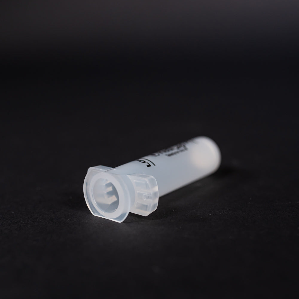 A small clear plastic cartridge displayed on a black background, creating a striking visual contrast between the two elements.
