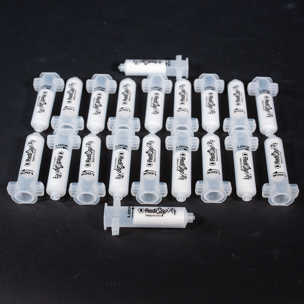 A set of small clear plastic cartridges displayed on a black background, creating a striking visual contrast between the two elements.