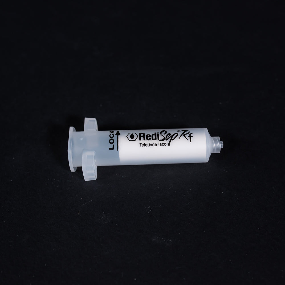 A small clear plastic cartridge displayed on a black background, creating a striking visual contrast between the two elements.