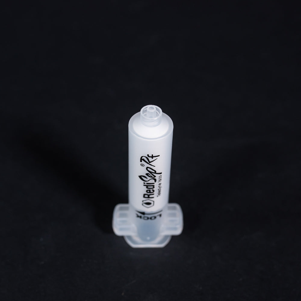 A small clear plastic cartridge displayed on a black background, creating a striking visual contrast between the two elements.