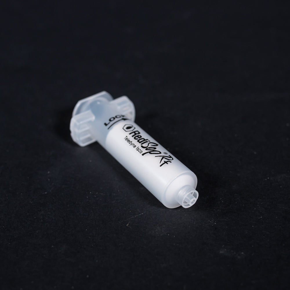 A small clear plastic cartridge displayed on a black background, creating a striking visual contrast between the two elements.