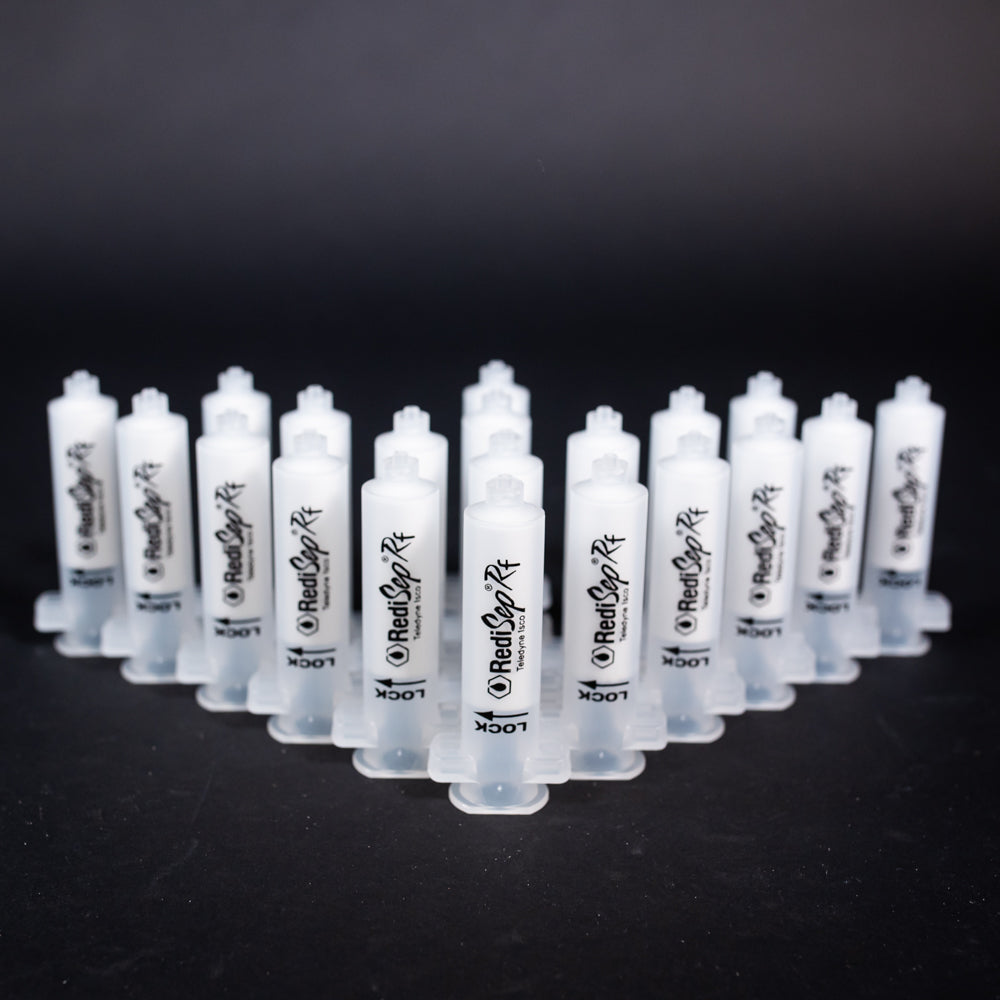 A set of small clear plastic cartridges displayed on a black background, creating a striking visual contrast between the two elements.