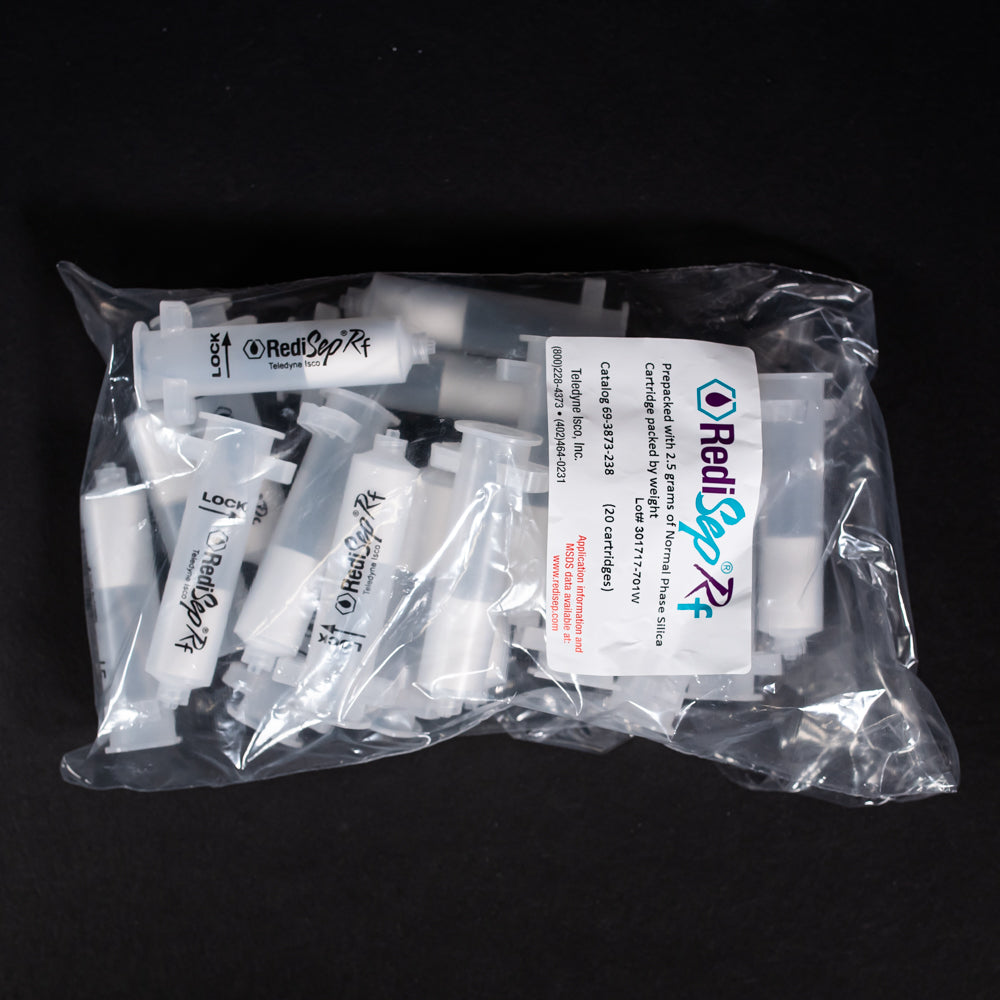 A set of small clear plastic cartridges displayed in a bag on a black background, creating a striking visual contrast between the two elements.