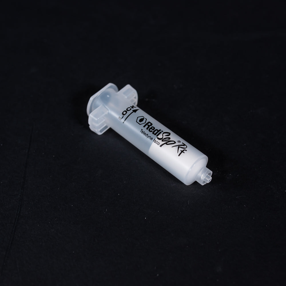 A set of small clear plastic cartridges displayed on a black background, creating a striking visual contrast between the two elements.