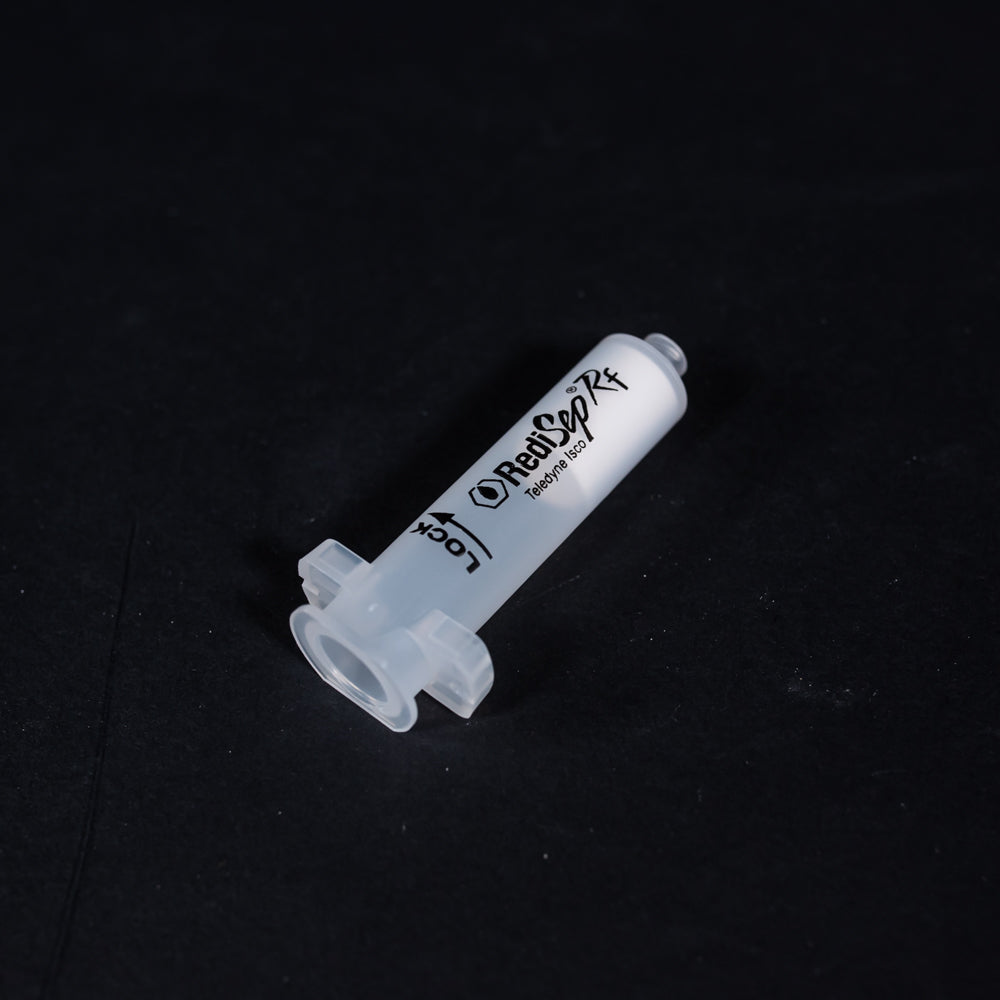 A set of small clear plastic cartridges displayed on a black background, creating a striking visual contrast between the two elements.