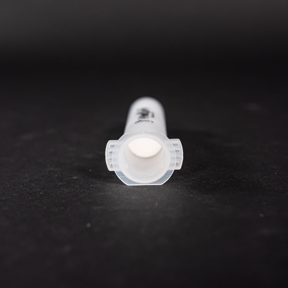 A small clear plastic cartridge displayed on a black background, creating a striking visual contrast between the two elements.