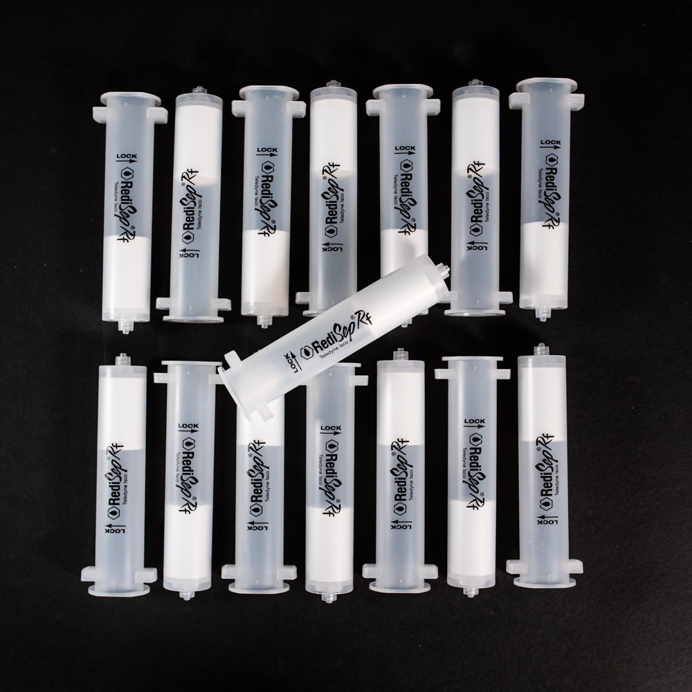 A set of small clear plastic cartridges displayed on a black background, creating a striking visual contrast between the two elements.