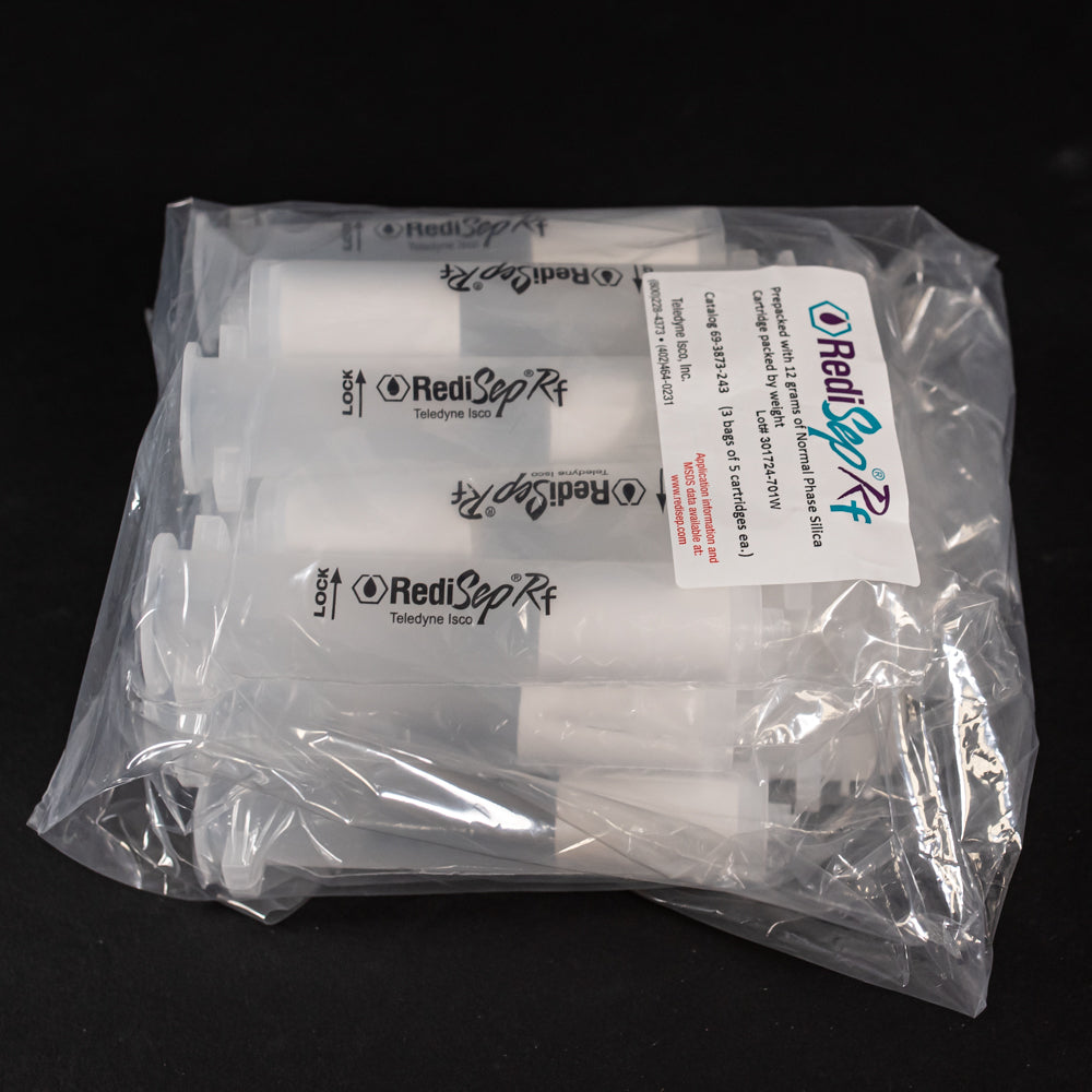 A set of small clear plastic cartridges displayed in a bag on a black background, creating a striking visual contrast between the two elements.